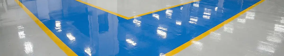 A factory floor professionally covered and marked with epoxy flooring in Riverside, CA