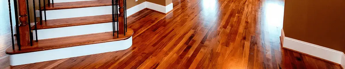 Base floor of a staircase with professionally restored wood flooring in Riverside CA
