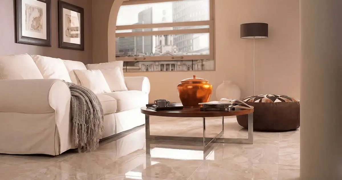 Modern living room with professionally installed marble flooring, a beige sofa, coffee table in Riverside, CA
