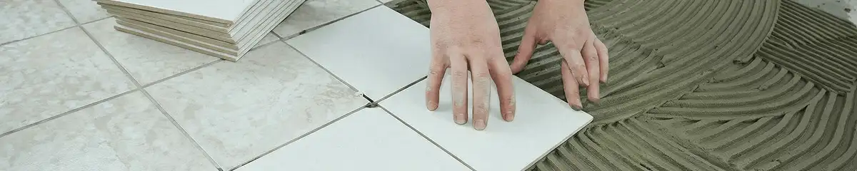 Professional installing white tile floors in Riverside, CA