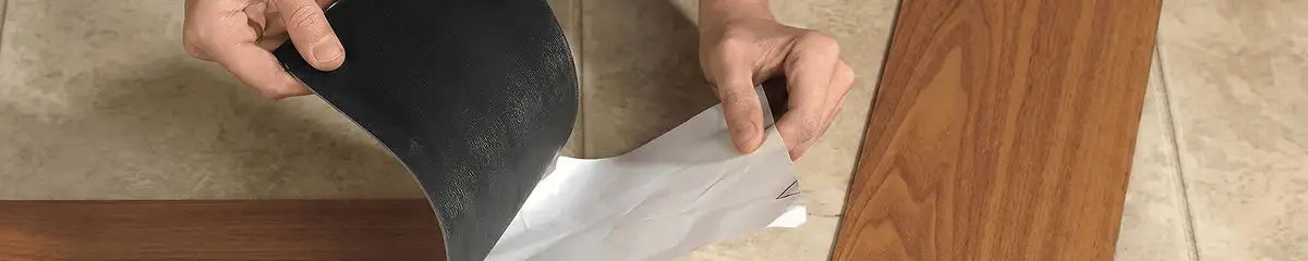 A professional installing vinyl flooring in Riverside, CA